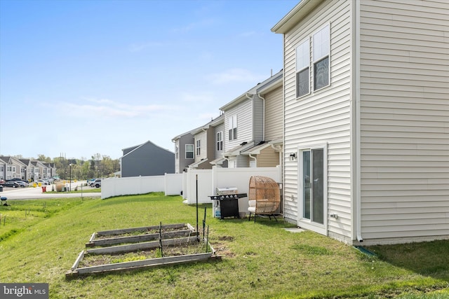 172 Scotch Pine Dr, Bunker Hill, WV 25413 - view of yard featuring fence, a residential view, and a garden