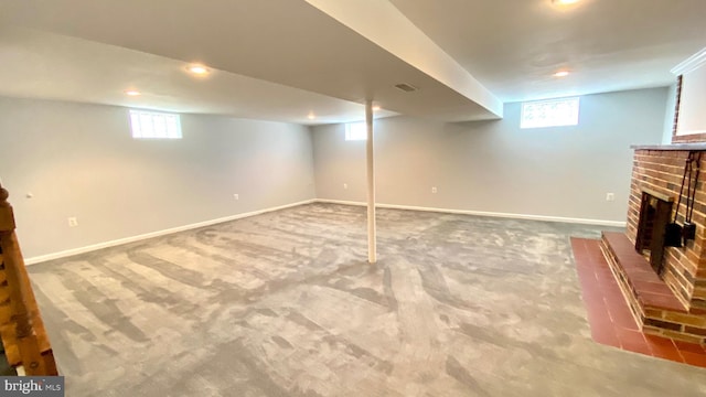 8107 Candle Ln, Baltimore, MD 21237 - below grade area with carpet floors, a fireplace, baseboards, visible vents, and recessed lighting