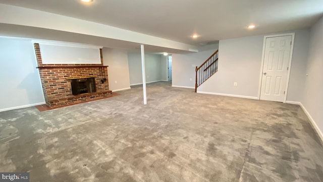 8107 Candle Ln, Baltimore, MD 21237 - finished basement with stairway, carpet, a fireplace, baseboards, and recessed lighting