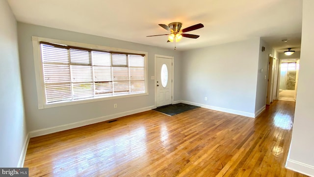 8107 Candle Ln, Baltimore, MD 21237 - entrance foyer with baseboards, hardwood / wood-style flooring, and ceiling fan