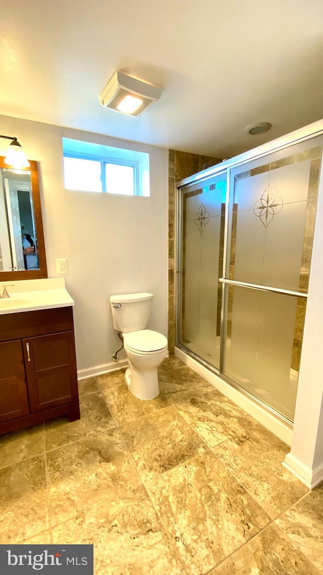 8107 Candle Ln, Baltimore, MD 21237 - full bathroom with toilet, vanity, and a stall shower