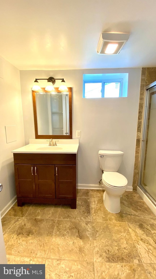 8107 Candle Ln, Baltimore, MD 21237 - full bath featuring baseboards, toilet, vanity, and a stall shower