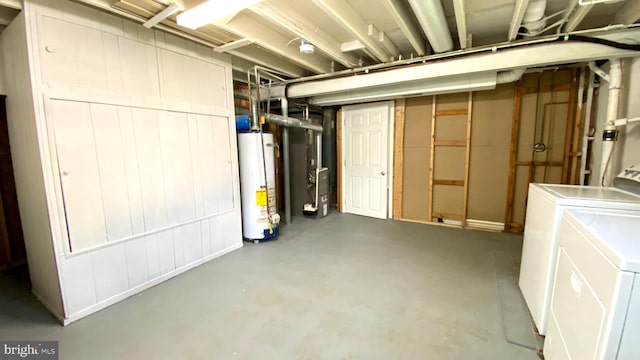 8107 Candle Ln, Baltimore, MD 21237 - unfinished below grade area with water heater, heating unit, and independent washer and dryer