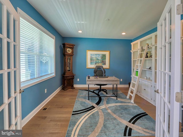 22144 Welches Way, Lewes, DE 19958 - office area with french doors, wood finished floors, recessed lighting, and baseboards