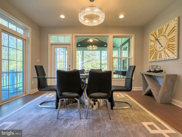 22144 Welches Way, Lewes, DE 19958 - dining space with wood finished floors, baseboards, a chandelier, and recessed lighting