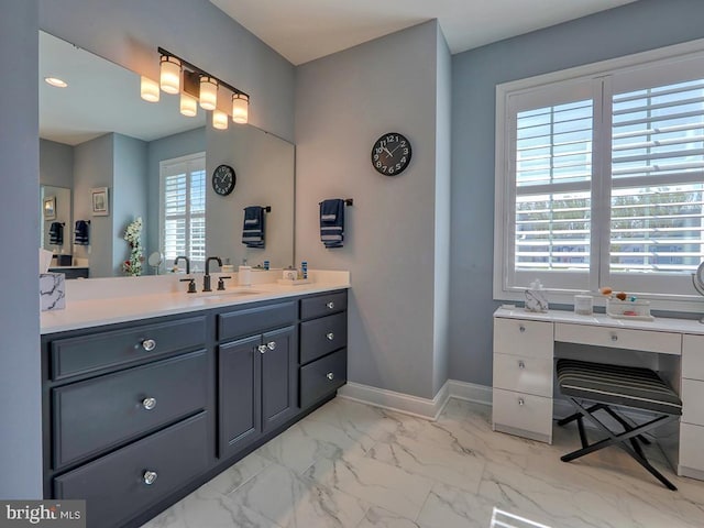 22144 Welches Way, Lewes, DE 19958 - bathroom featuring marble look tiles, vanity, and baseboards