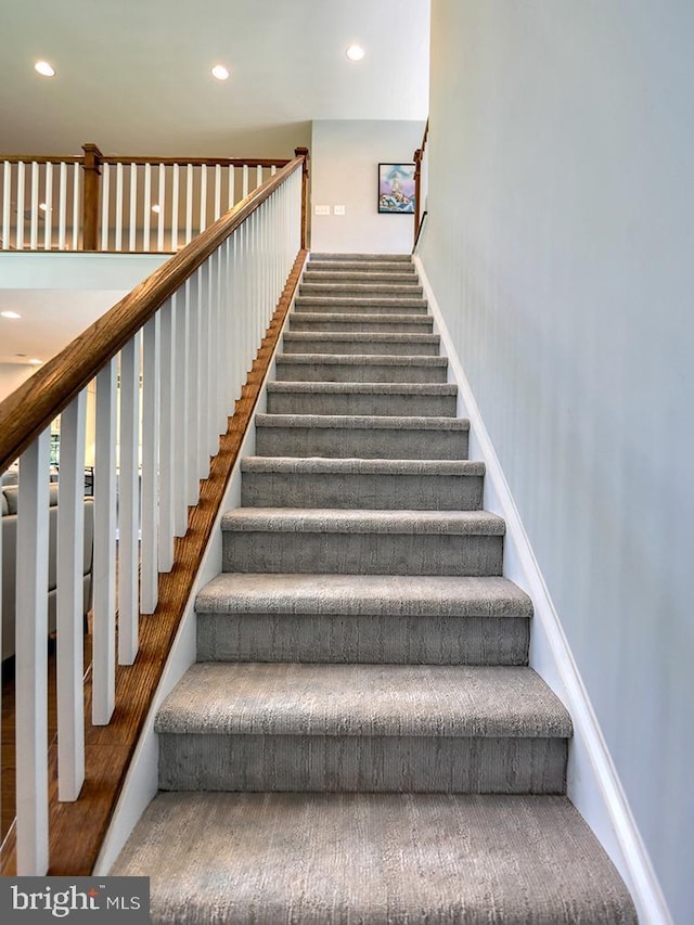 22144 Welches Way, Lewes, DE 19958 - stairs featuring recessed lighting and carpet flooring