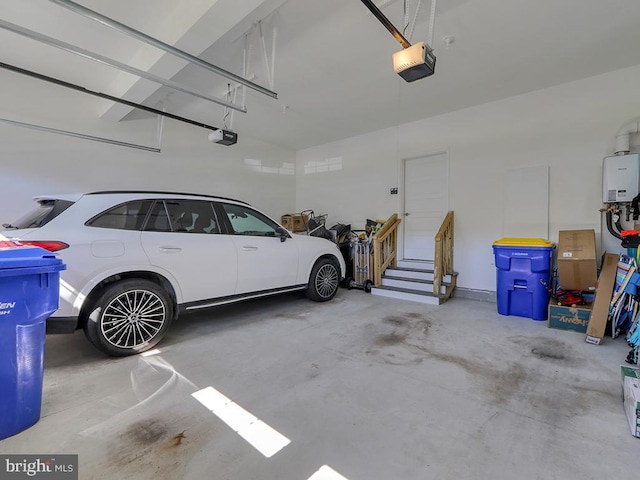 22144 Welches Way, Lewes, DE 19958 - garage with a garage door opener and tankless water heater