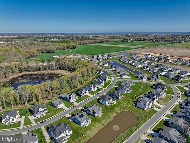 22144 Welches Way, Lewes, DE 19958 - aerial view of property's location with a large body of water and nearby suburban area