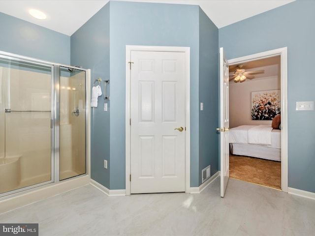 ensuite bathroom featuring a stall shower, visible vents, baseboards, ceiling fan, and connected bathroom