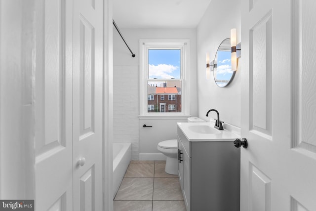 full bathroom featuring vanity, toilet, tub / shower combination, and baseboards
