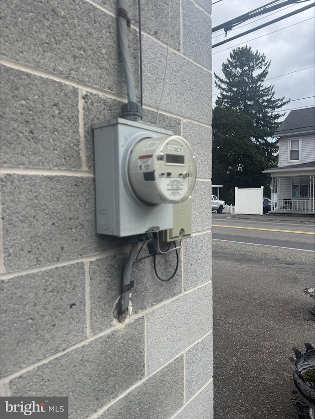 exterior details featuring electric meter
