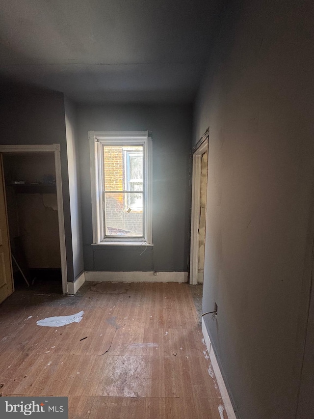 2555 N 33rd St, Philadelphia, PA 19132 - unfurnished bedroom with light wood-style floors and baseboards