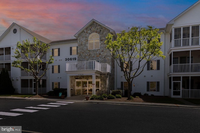 view of property at dusk