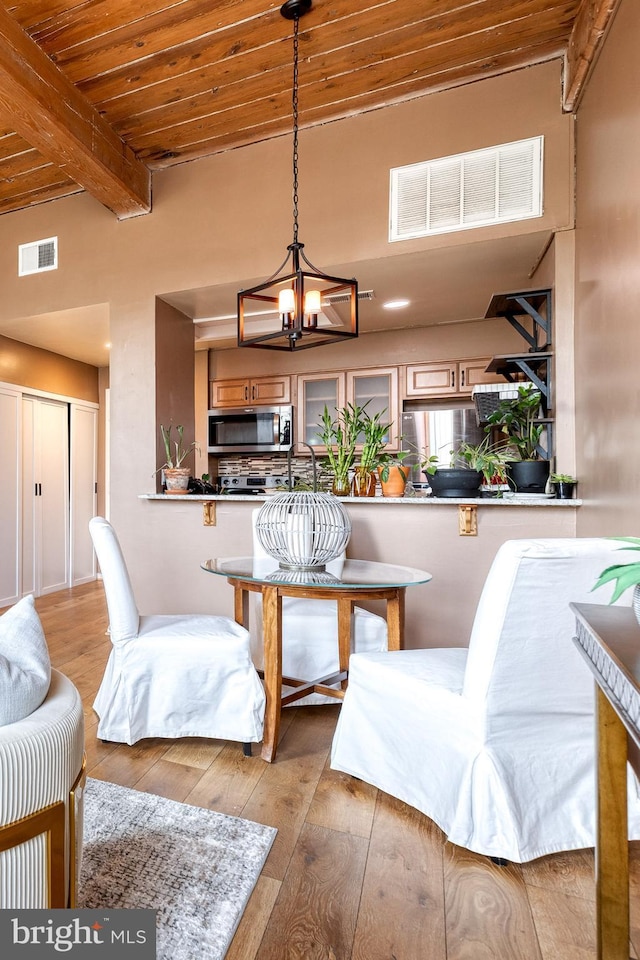 2639 Boston St Unit 203, Baltimore, MD 21224 - interior space with beamed ceiling, visible vents, and light wood-style floors
