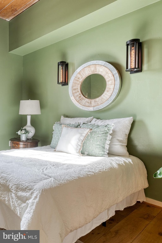 2639 Boston St Unit 203, Baltimore, MD 21224 - bedroom featuring wood finished floors and baseboards