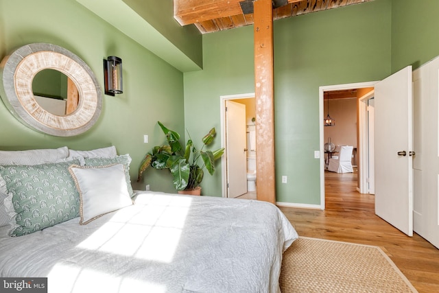 2639 Boston St Unit 203, Baltimore, MD 21224 - bedroom featuring wood finished floors and baseboards