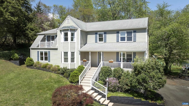 1720 Franklin Dr, Charlottesville, VA 22911 - view of front of home with a front yard, covered porch, stairs, and roof with shingles