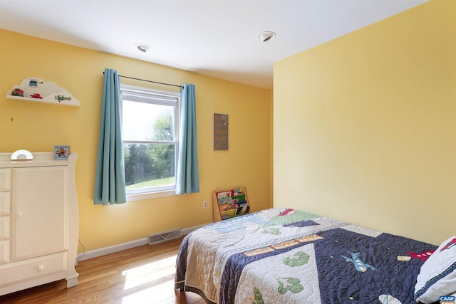 1720 Franklin Dr, Charlottesville, VA 22911 - bedroom with wood finished floors, visible vents, and baseboards