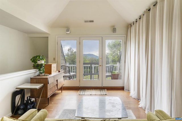 1720 Franklin Dr, Charlottesville, VA 22911 - entryway featuring vaulted ceiling, visible vents, light wood-style flooring, and french doors