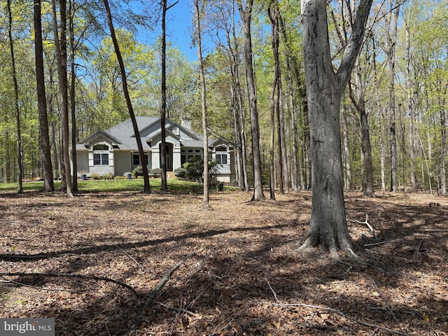 14500 River Junction Dr, Fredericksburg, VA 22407 - view of front of home featuring a wooded view