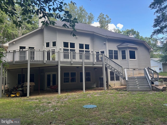 14500 River Junction Dr, Fredericksburg, VA 22407 - rear view of house with a deck, stairs, and a yard