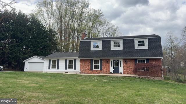 281 Warburton Road, North East, MD 21901 - view of front facade with a front lawn and brick siding
