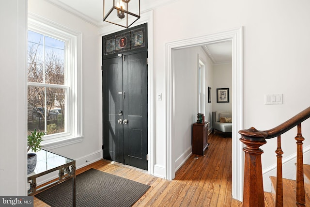 20-22 W Harvey St, Philadelphia, PA 19144 - foyer with ornamental molding, hardwood / wood-style floors, baseboards, and stairway