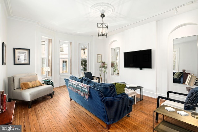 20-22 W Harvey St, Philadelphia, PA 19144 - living room with arched walkways and hardwood / wood-style flooring
