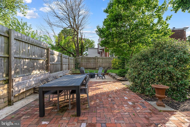 20-22 W Harvey St, Philadelphia, PA 19144 - view of patio featuring a fenced backyard, an outdoor fire pit, and outdoor dining space
