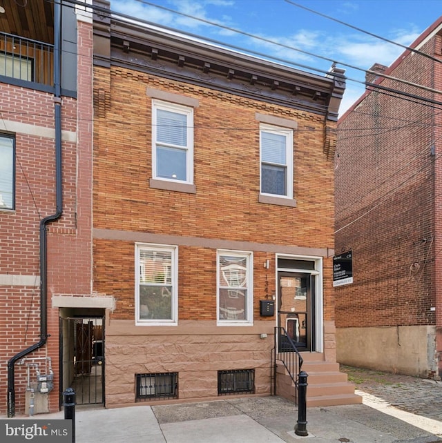 view of front facade with brick siding