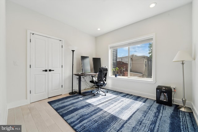 home office with wood finished floors, baseboards, and recessed lighting