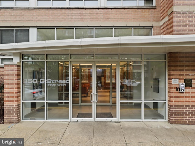 350 G St SW Unit N407, Washington, DC 20024 - view of exterior entry featuring brick siding