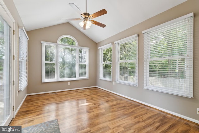 15915 Marlington Dr, Dumfries, VA 22025 - unfurnished sunroom with wood finished floors, lofted ceiling, and baseboards