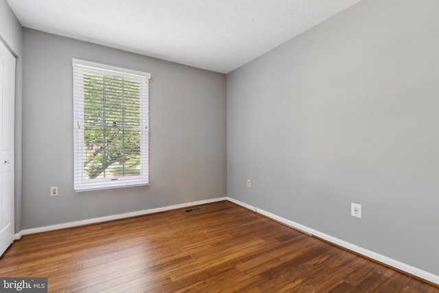 15915 Marlington Dr, Dumfries, VA 22025 - spare room with wood finished floors and baseboards