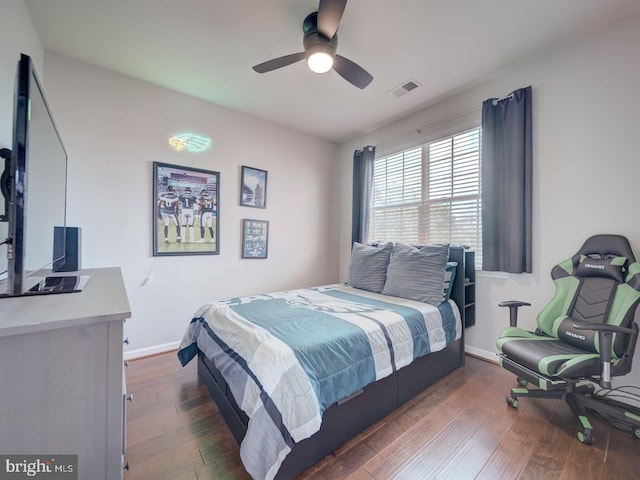 9477 Cromarty Ct, Bristow, VA 20136 - bedroom with baseboards, ceiling fan, and hardwood / wood-style flooring