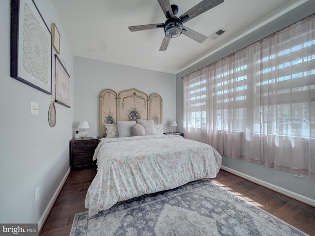 9477 Cromarty Ct, Bristow, VA 20136 - bedroom with a ceiling fan, baseboards, visible vents, and wood finished floors