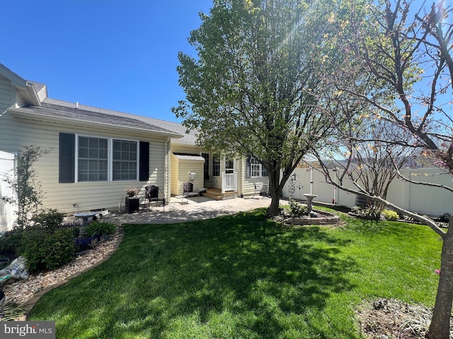 561 Great Oak Ct, Woodstock, VA 22664 - back of house with fence, a yard, a patio, and entry steps
