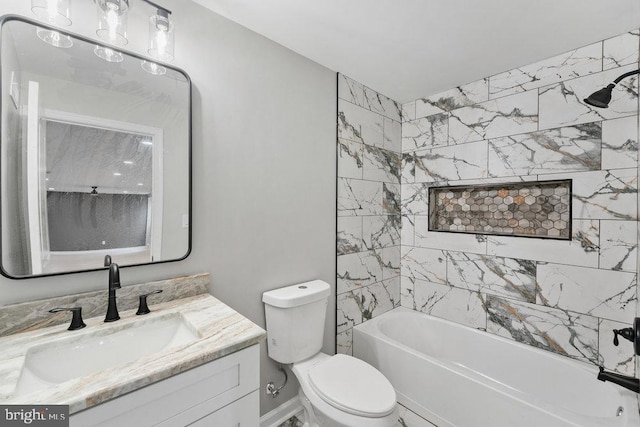 full bath with toilet, vanity, and tub / shower combination