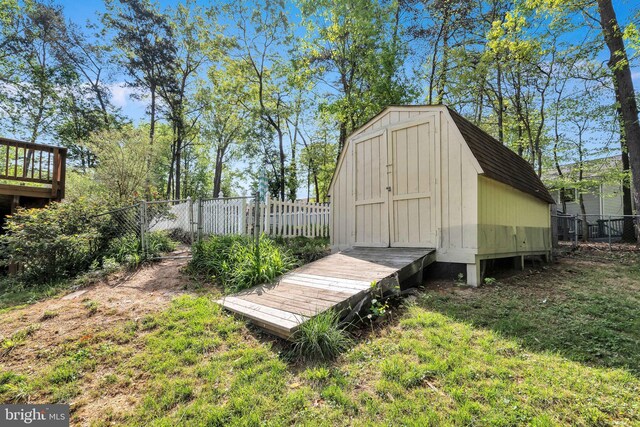view of shed with a fenced backyard