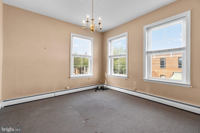 196 E Main St, Westminster, MD 21157 - carpeted empty room with an inviting chandelier