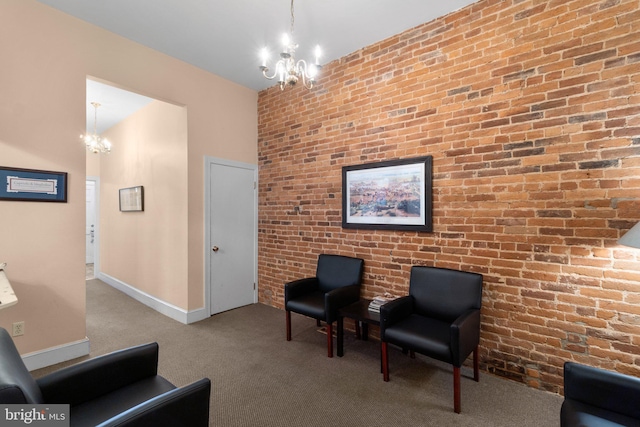 196 E Main St, Westminster, MD 21157 - sitting room with an inviting chandelier, baseboards, carpet flooring, and brick wall