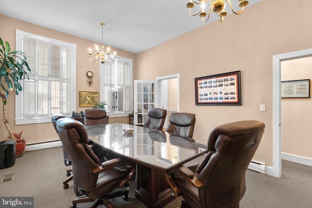 196 E Main St, Westminster, MD 21157 - carpeted dining area featuring a baseboard heating unit, a chandelier, and a healthy amount of sunlight