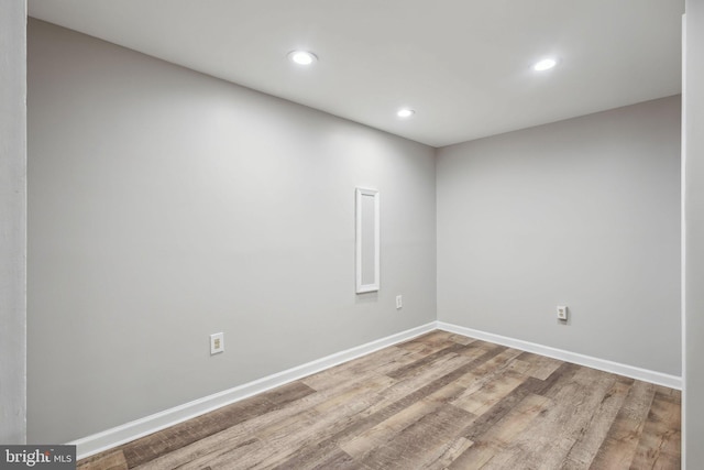1070 Trevino Ln, Herndon, VA 20170 - spare room featuring baseboards, recessed lighting, and wood finished floors