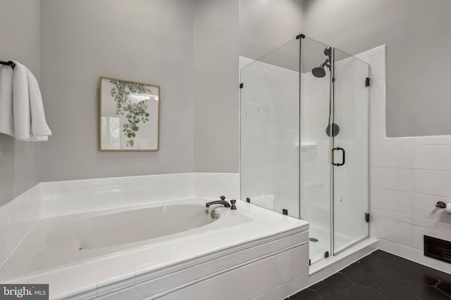 1070 Trevino Ln, Herndon, VA 20170 - full bath featuring tile patterned flooring, a bath, and a shower stall