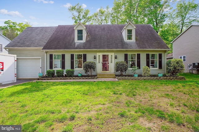 813 Petinot Pl, Stevensville, MD 21666 - cape cod-style house with a garage, a front yard, and driveway