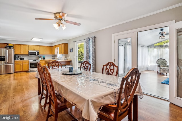 813 Petinot Pl, Stevensville, MD 21666 - dining space featuring light wood-type flooring, a ceiling fan, and ornamental molding