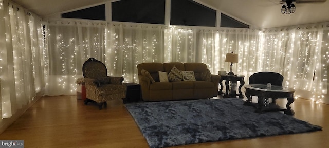 813 Petinot Pl, Stevensville, MD 21666 - living area with vaulted ceiling, wood finished floors, and ceiling fan