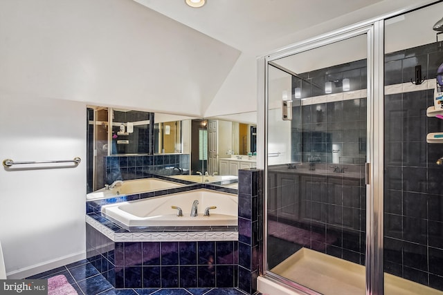 813 Petinot Pl, Stevensville, MD 21666 - bathroom featuring tile patterned flooring, a garden tub, a stall shower, baseboards, and vanity