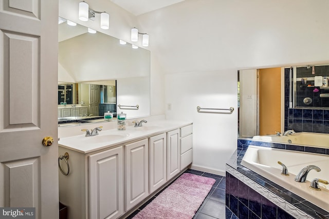 813 Petinot Pl, Stevensville, MD 21666 - bathroom with a garden tub, tile patterned floors, and double vanity